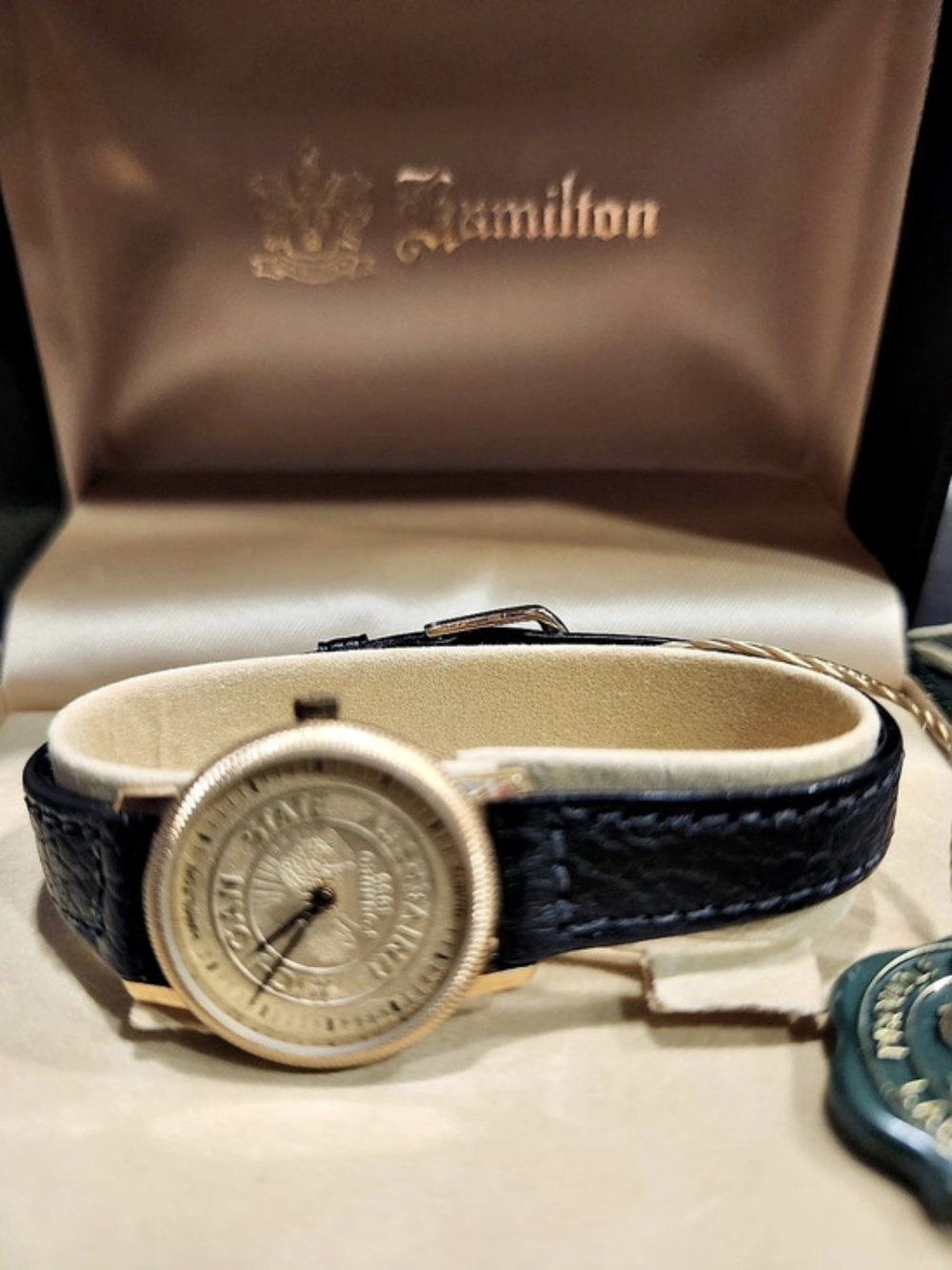 Hamilton Gold-Tone Watch with Black Strap